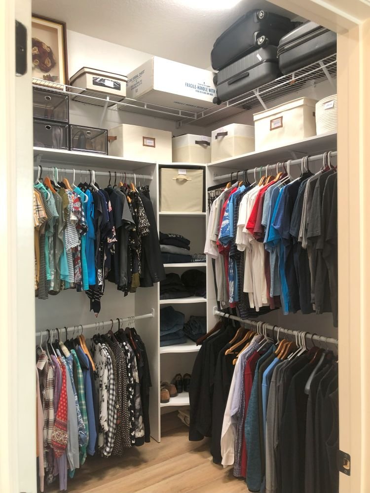 Right-side view of an organized closet featuring folded clothes, cubby shoe storage, and categorized hanging items—demonstrating how to declutter your wardrobe.